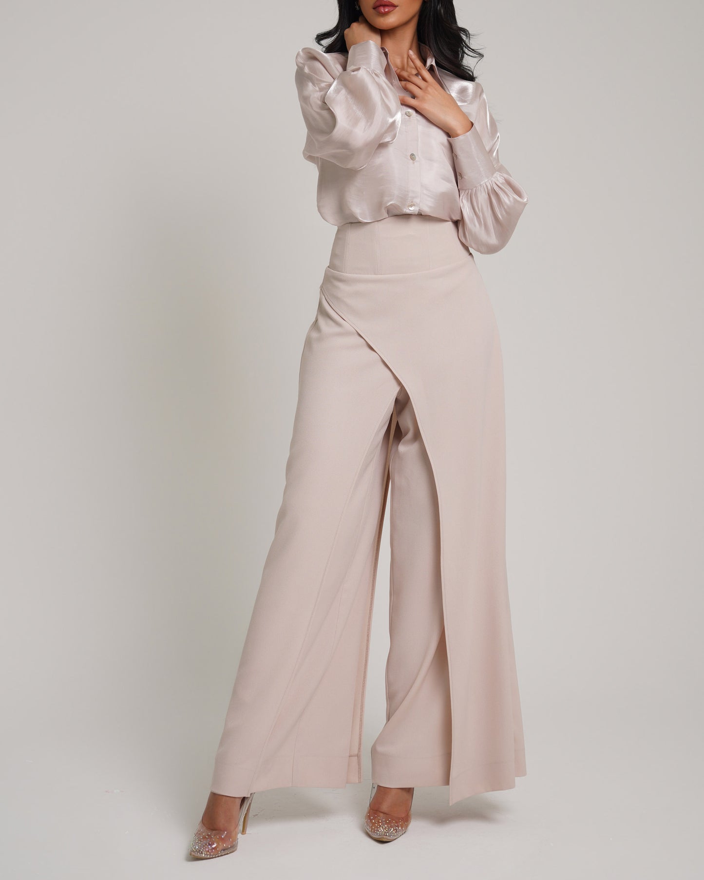 Overlapped corset waist trousers paired with organza shirt