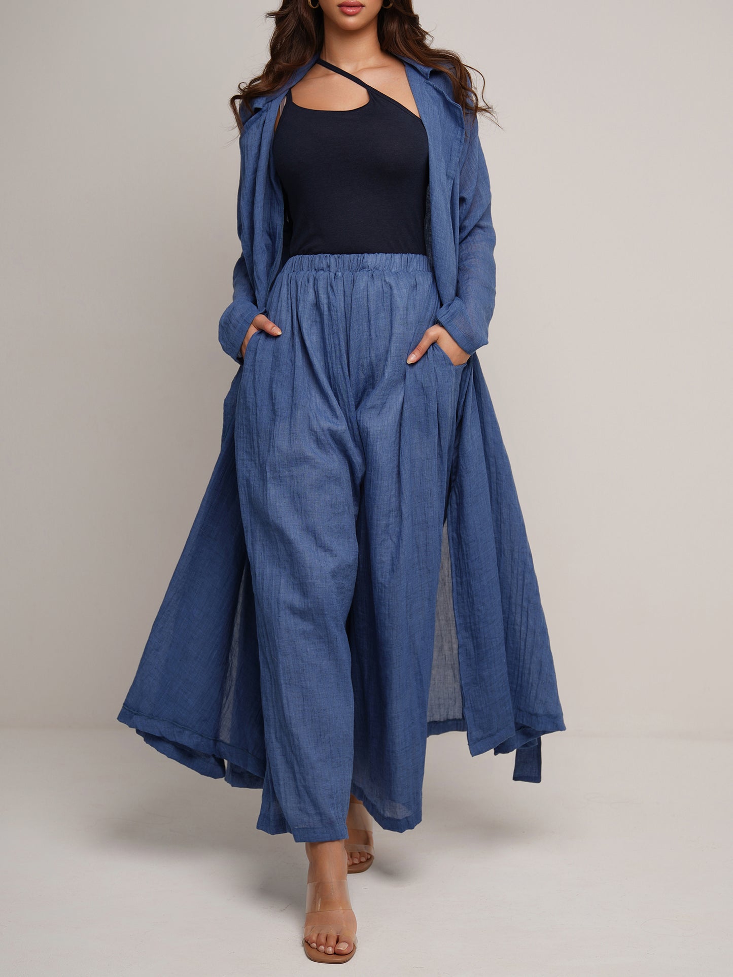 Indigo wash longline trench coat with wide leg trousers