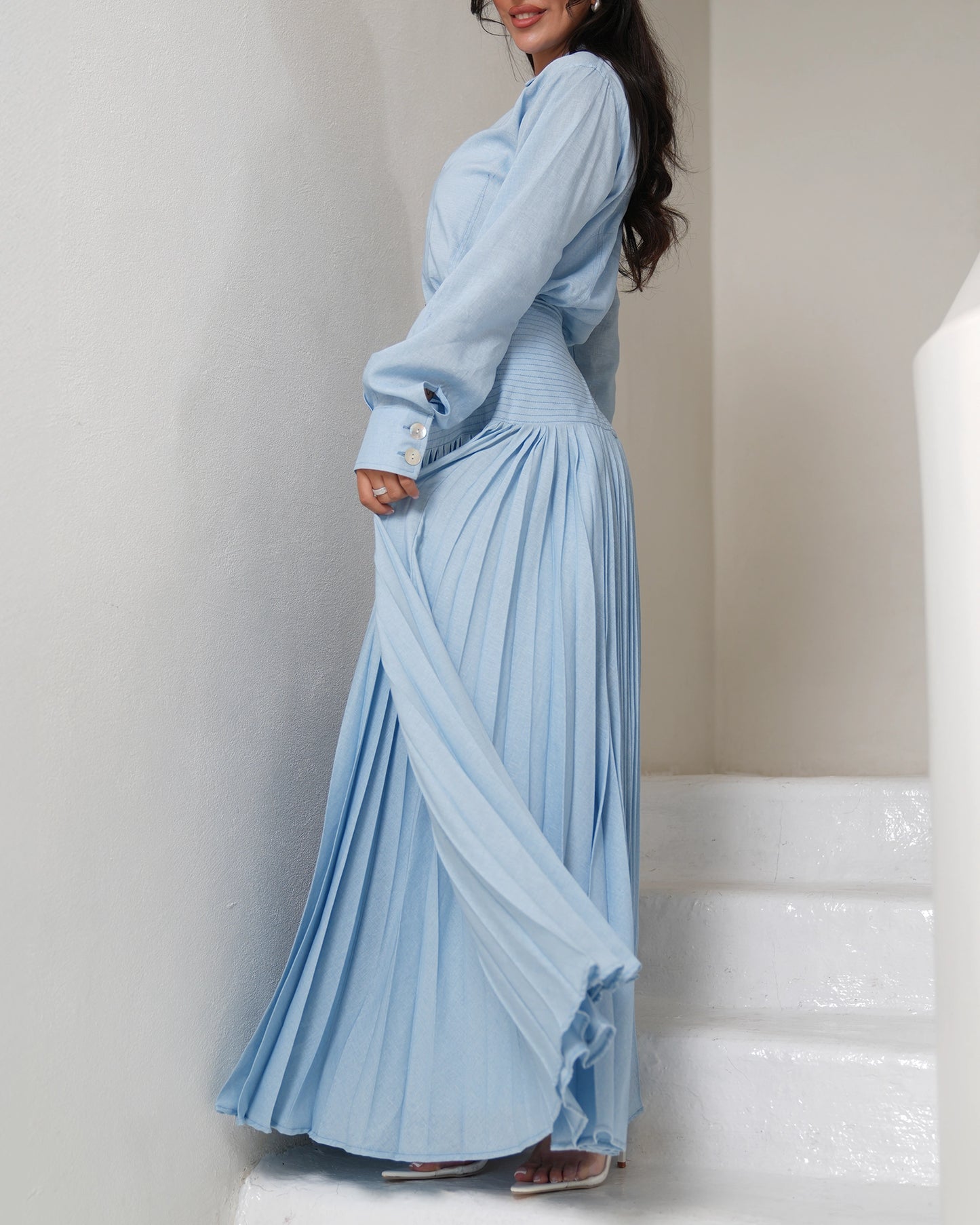 Pleated icy blue skirt with buttons up shirt