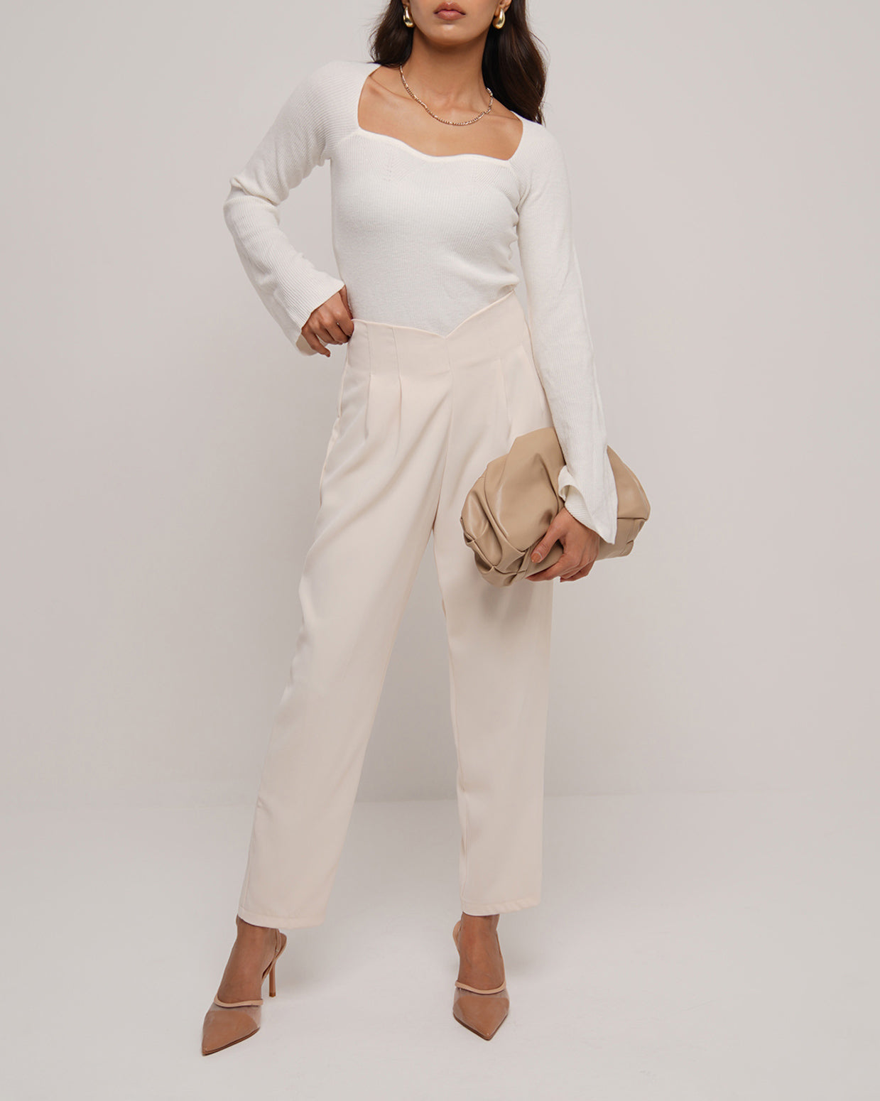 Creme High rise tapered legs trousers