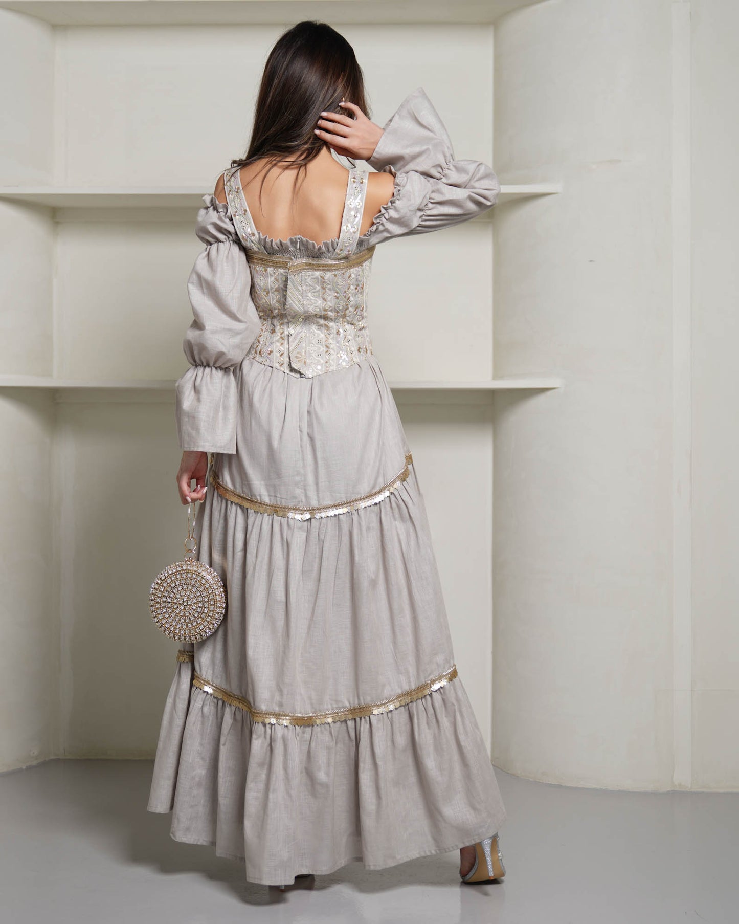 Corset gilet paired with off shoulder linen dress in grey