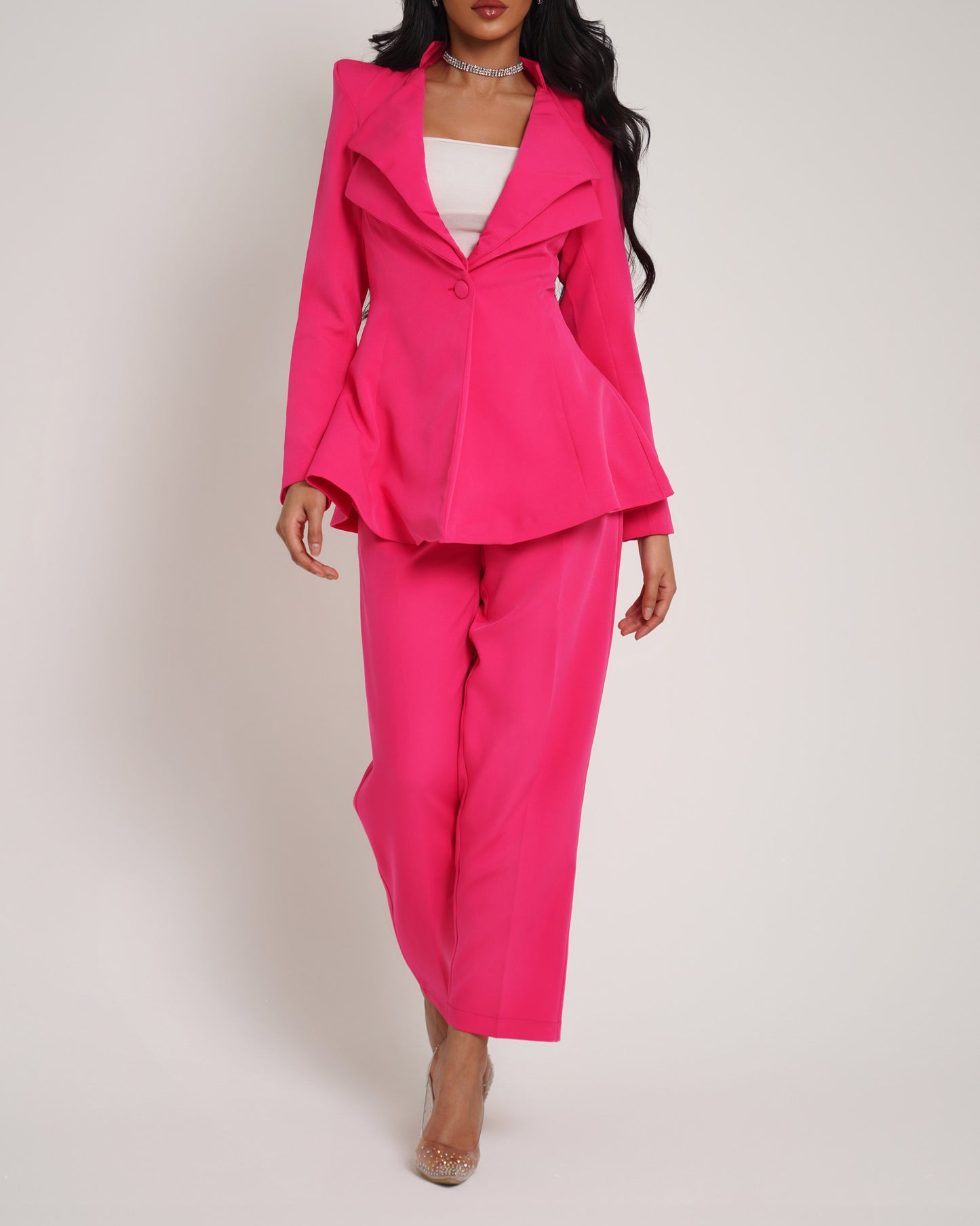 Deep pink pointed shoulder double collar blazer paired with straight leg trousers