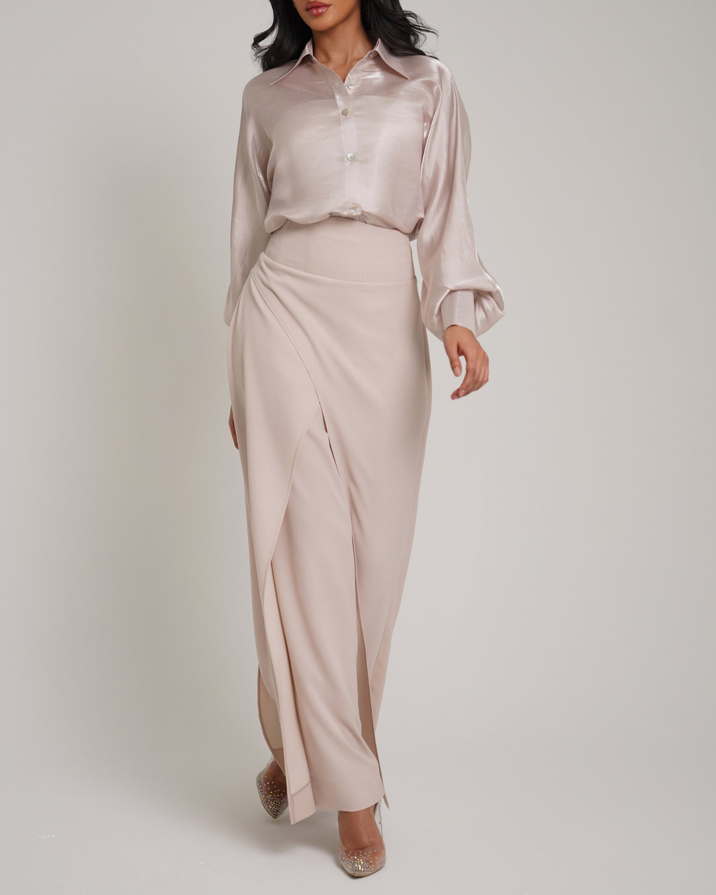 Overlapped corset waist trousers paired with organza shirt
