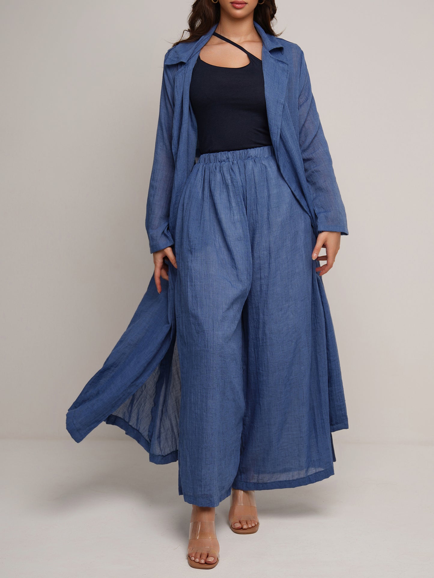 Indigo wash longline trench coat with wide leg trousers