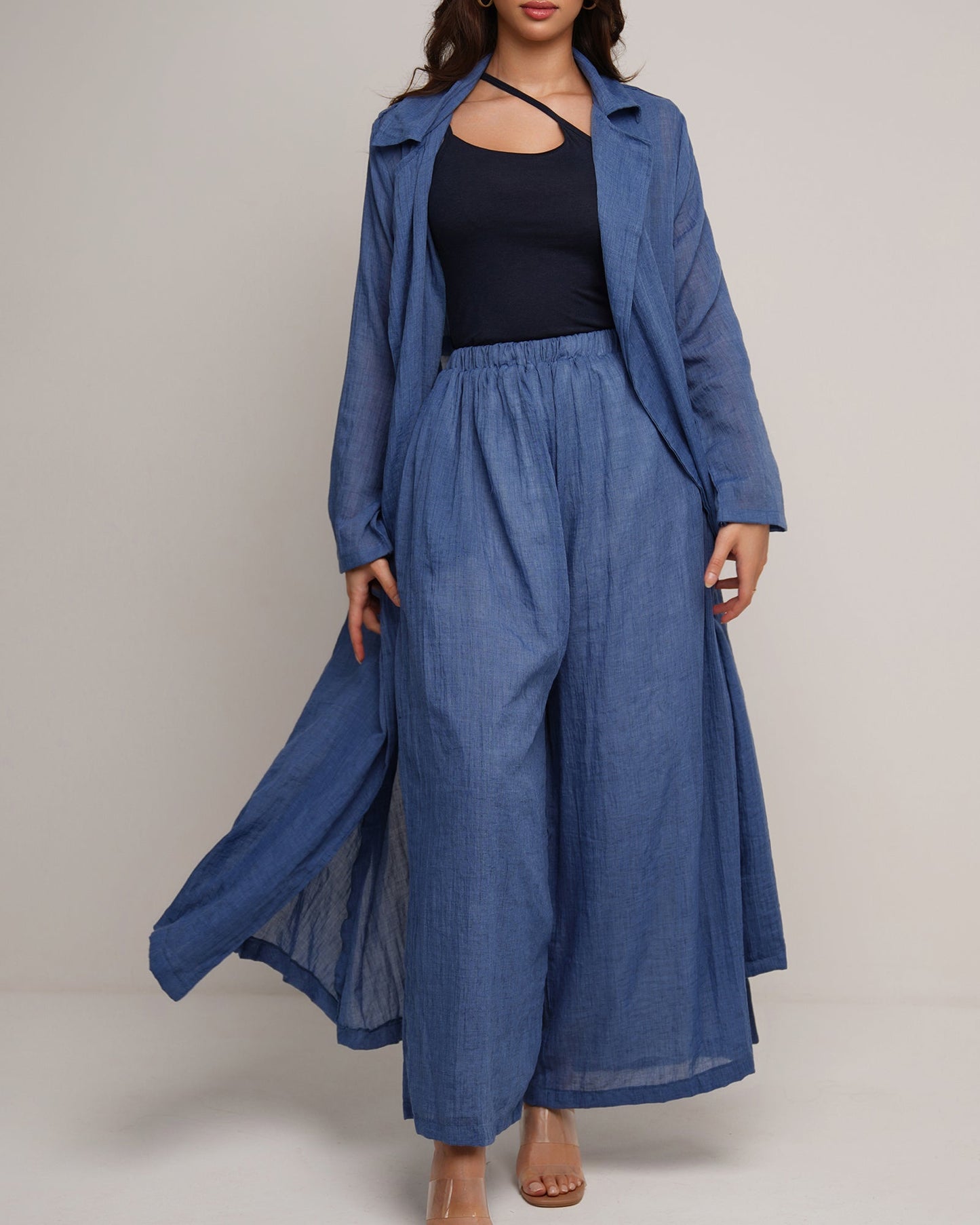 Indigo wash longline trench coat with wide leg trousers