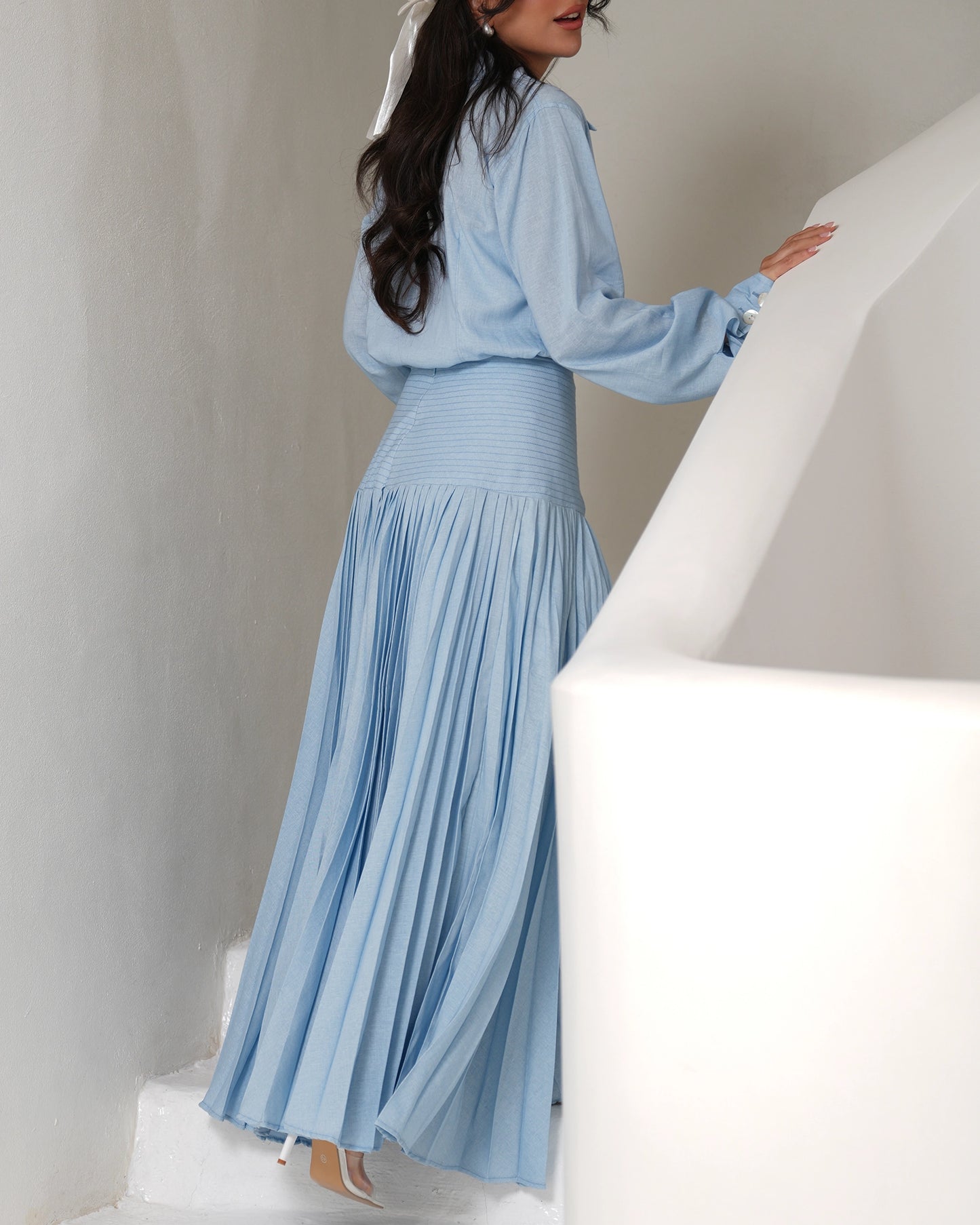 Pleated icy blue skirt with buttons up shirt