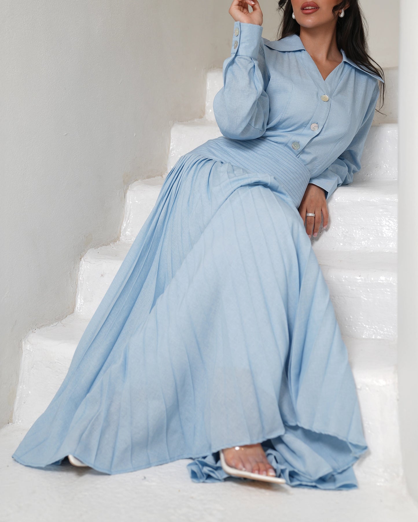 Pleated icy blue skirt with buttons up shirt