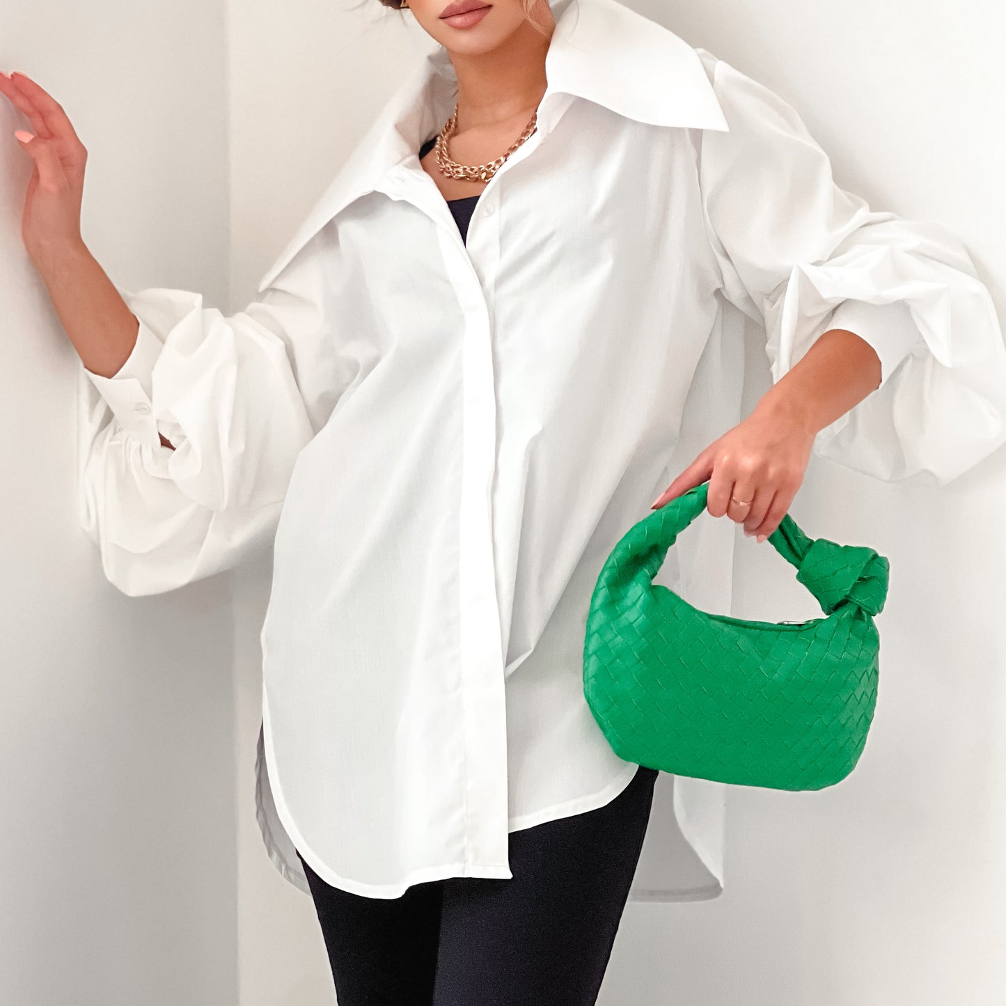 Oversized white cotton shirt with exaggerated collar in white