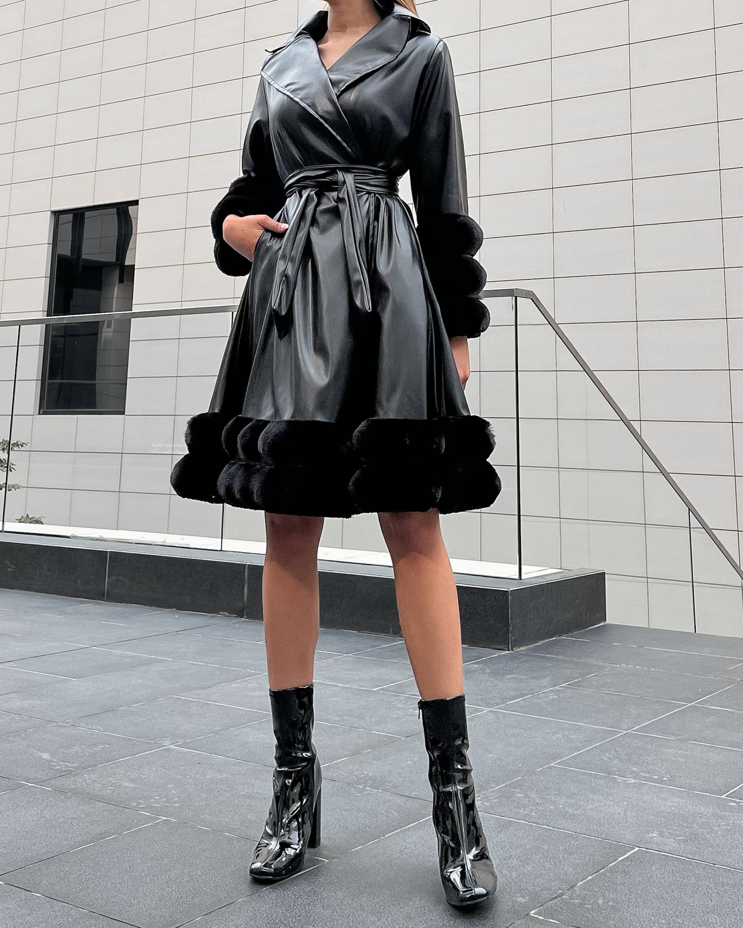 Black faux leather belted skater wrap dress with fur details