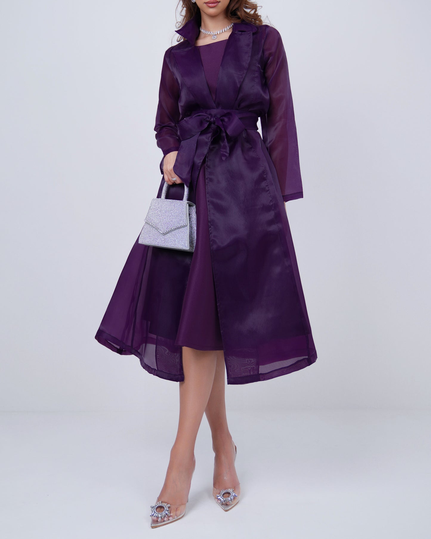 Satin dress toped with organza belted jacket in royal regalia