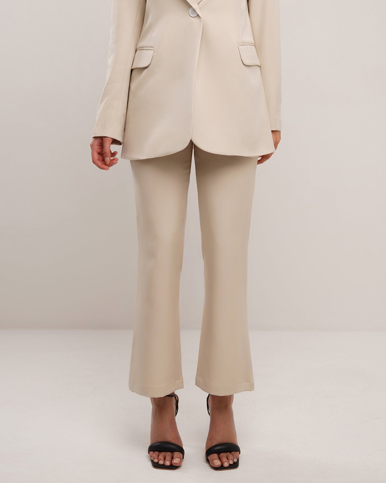 Sand dune beige classic jetted pocket flare trousers