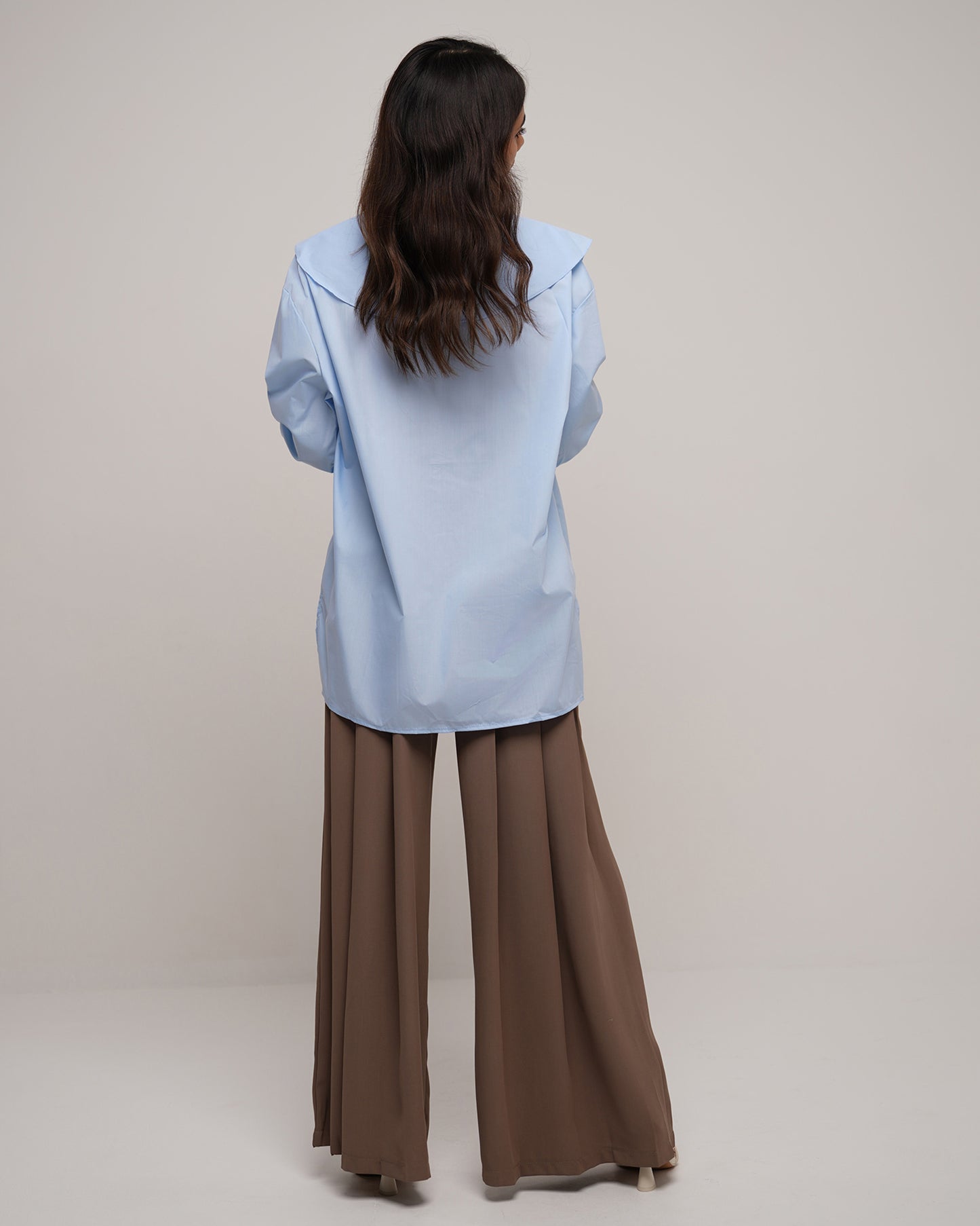 Irregular ruffled neckline shirt in baby blue