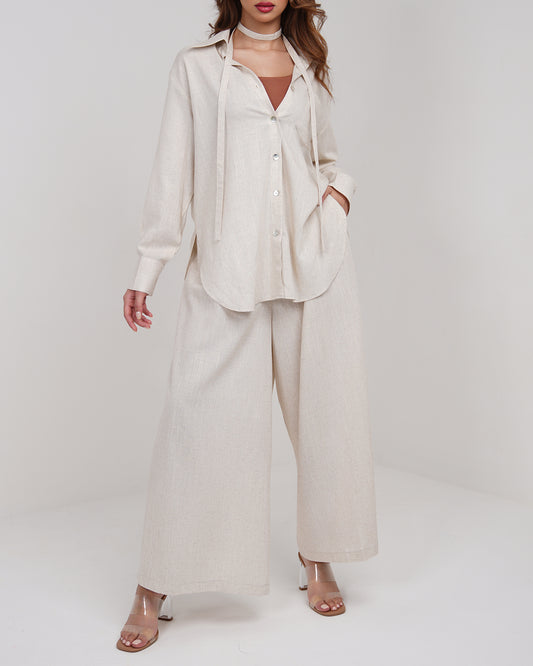 Buffed beige buttons up shirt with culottes trousers