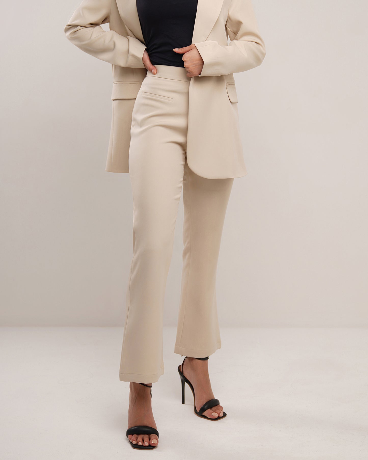 Sand dune beige classic jetted pocket flare trousers